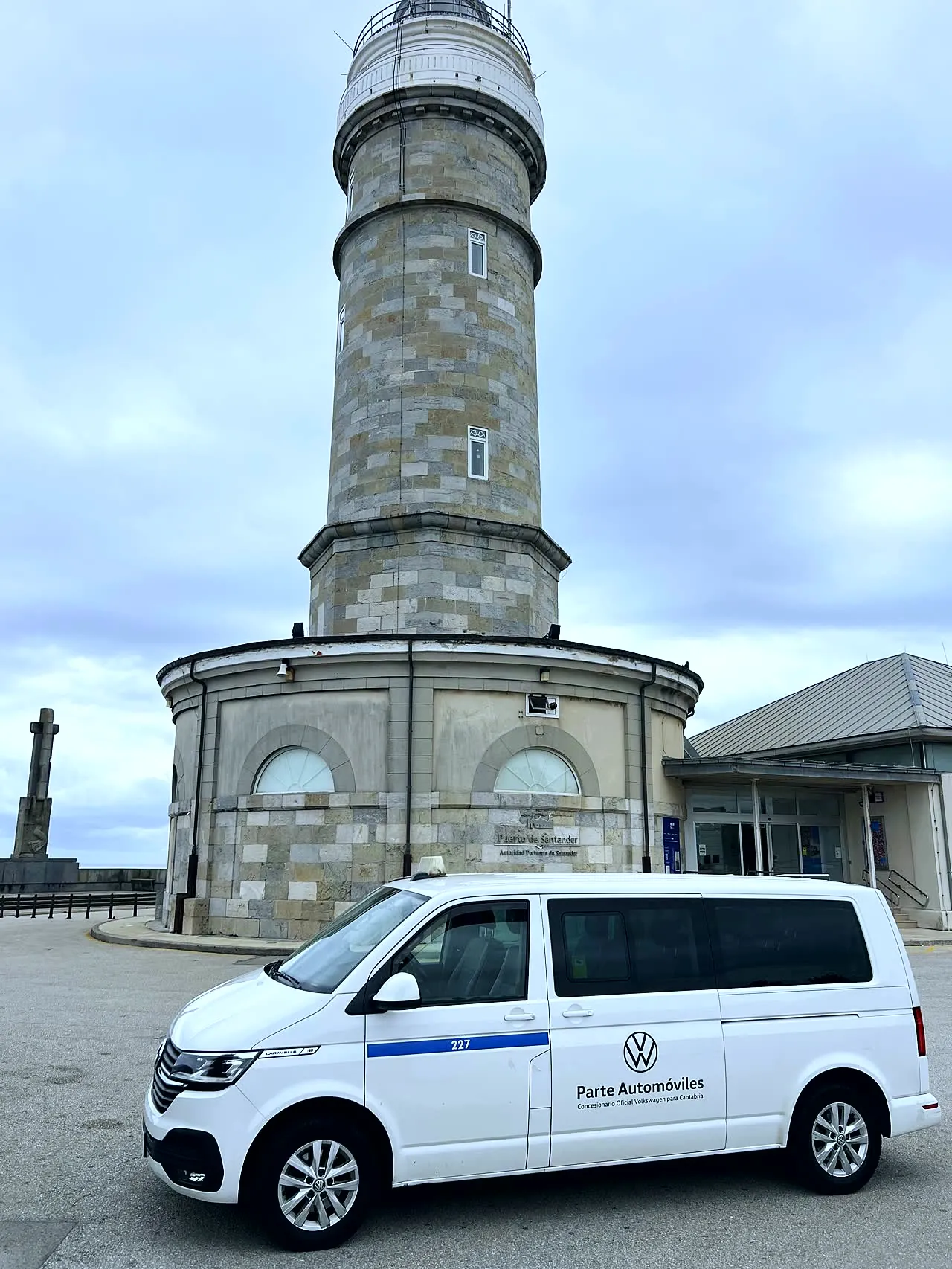 White 8-seater van parked next to the Cabo Mayor lighthouse