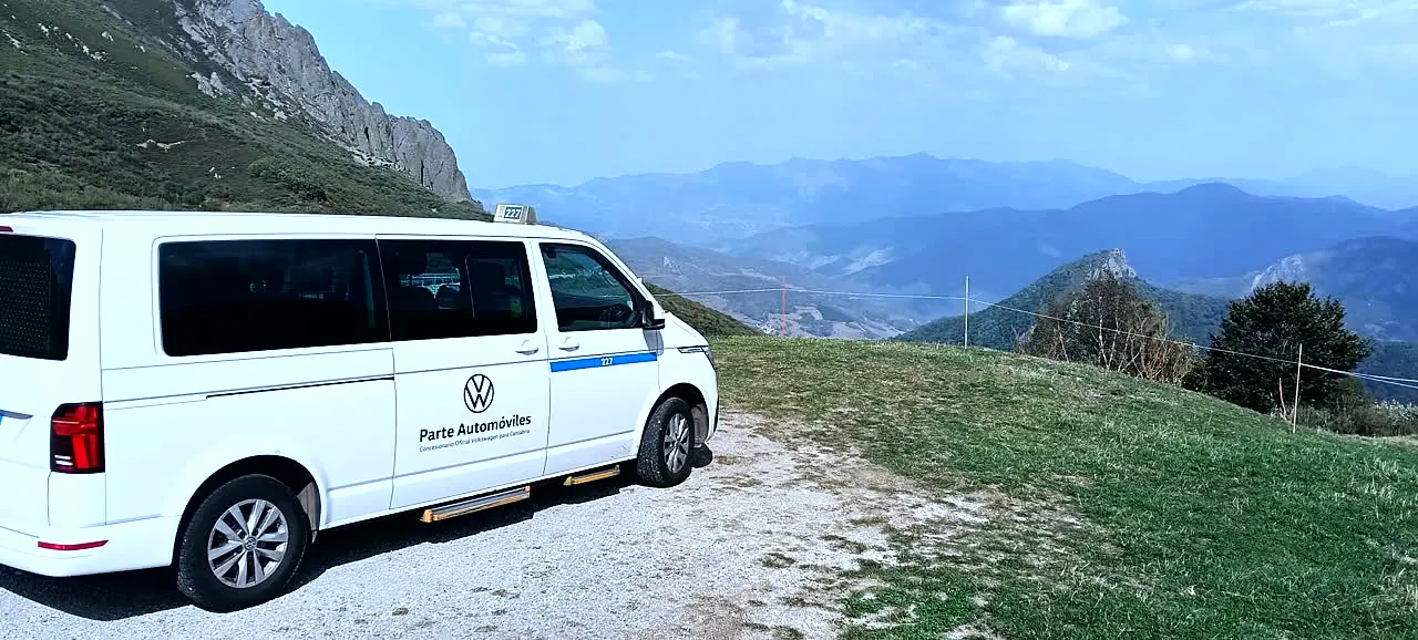Van at a viewpoint overlooking the Picos de Europa
