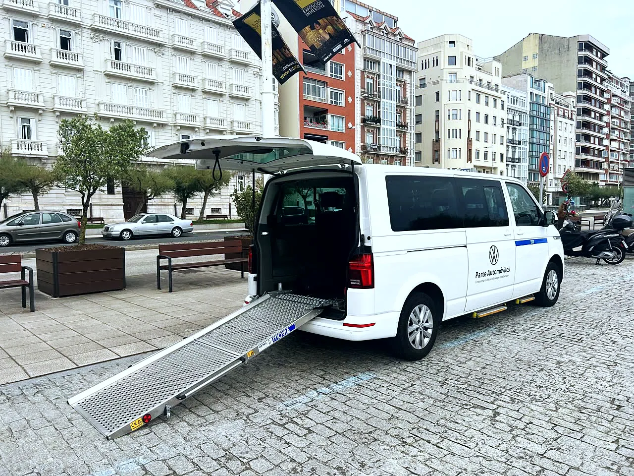 Rear ramp of the van lowered so a wheelchair can board